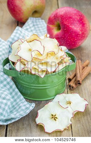 Healthy Snack. Homemade Apple Chips On Rustic Wooden Background
