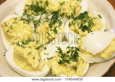 Boiled Eggs Sliced In Halves Stuffed And Filling By Pasta With Dill