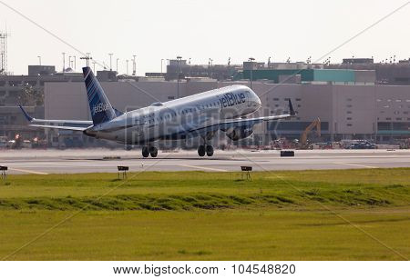 FORT LAUDERDALE, USA - May 24, 2015: A Jetblue Airlines Embraer 190 aircraft landing.