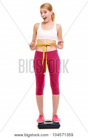 Happy Woman Measuring On Weighing Scale. Weight.