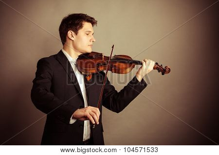 Man Violinist Playing Violin. Classical Music Art