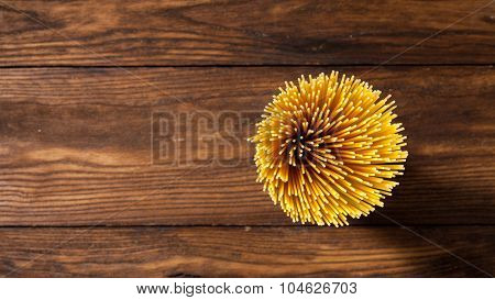 italian spaghetti on wooden background. Top view. Header for website