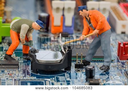 computer board and worker, symbol photo for computer failure, maintenance, data security
