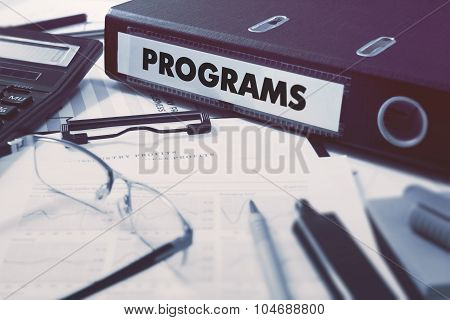 Office folder with inscription Programs.
