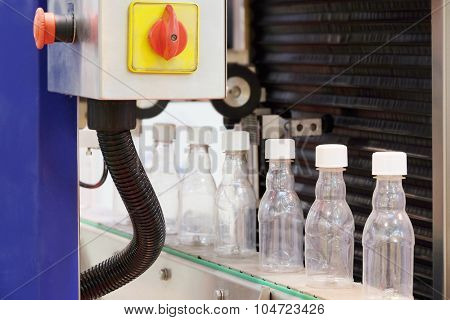 The image of food industry equipment for plastic bottles