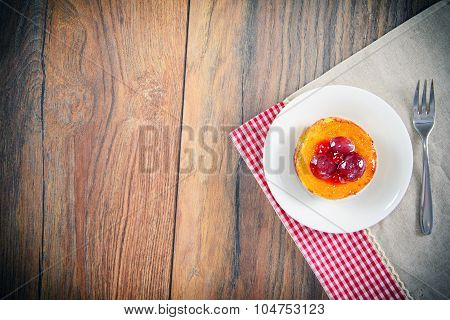 Fruit Cake on Vintage Retro Woody Background