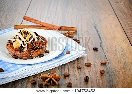 Chocolate Nut Cake on Vintage Retro Woody Background