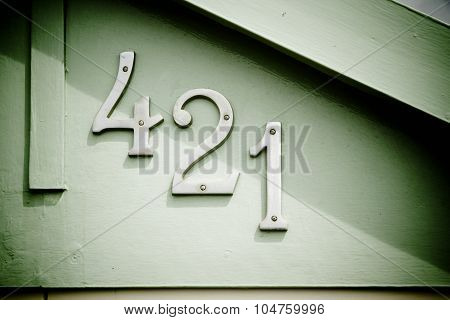 Metal Numbers On Beach Hut