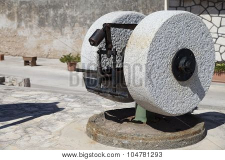 Press for squeezing oil from olives