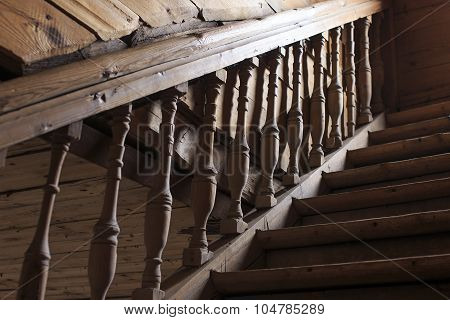 old wooden staircase railing