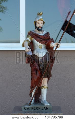 PETINA, CROATIA - JUNE 10: The statue of St. Florian patron of firefighters in front of the fire department Kosnica in Petina, Croatia on June 10, 2015.