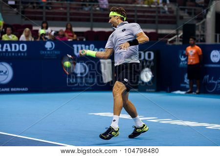 KUALA LUMPUR, MALAYSIA - OCTOBER 03, 2015: Spain's tennis player David Ferrer plays a forehand return at the 2015 Malaysian Open tennis tournament from Sep 26 - Oct 4, 2015 in Stadium Putra.