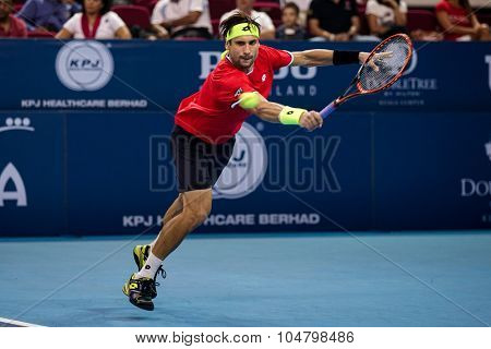 KUALA LUMPUR, MALAYSIA - OCTOBER 03, 2015: Spain's tennis player David Ferrer plays a backhand return at the 2015 Malaysian Open tennis tournament from Sep 26 - Oct 4, 2015 in Stadium Putra. 
