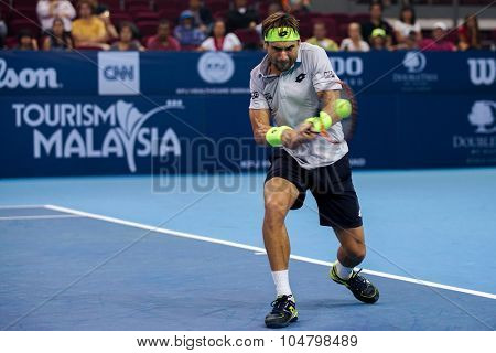 KUALA LUMPUR, MALAYSIA - OCTOBER 03, 2015: Spain's tennis player David Ferrer plays a backhand return at the 2015 Malaysian Open tennis tournament from Sep 26 - Oct 4, 2015 in Stadium Putra.