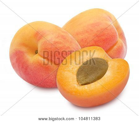 Three fresh ripe apricots
