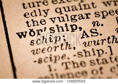 Close-up Of An Opened Dictionary Showing The Word Worship