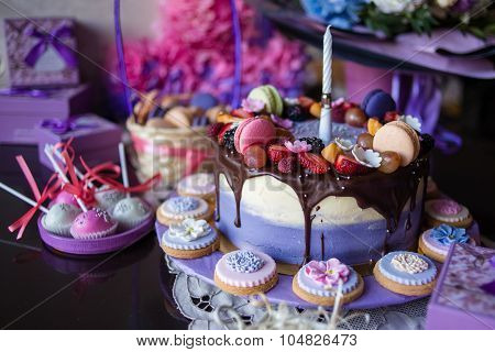Beautiful Purple Cake With Macaron And Biscuits On The Table