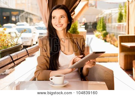 At Lunch Young Woman With Digitale Tablet And Cup Of Coffee In Cafe