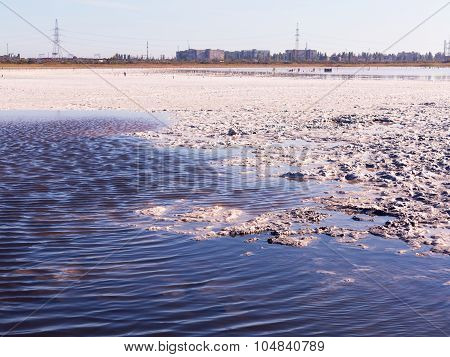 Petrified Salt Made Dry Red Estuary. Kuyalnik In Odessa, Ukraine. The Water Has Receded Far Into The