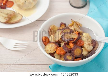 roasted root vegetables: potatoes, carrots, parsnips, sliced and roasted with honey and cinamon
