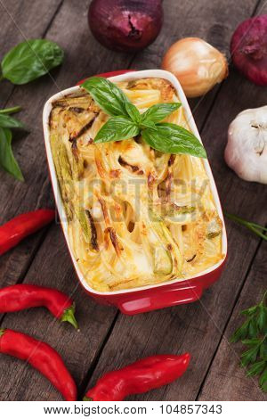 Pasticcio or pastitsio with zucchini and cheese, italian baked pasta
