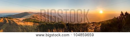 Panorama Of Amazing Sunrise On Mountain Ridge