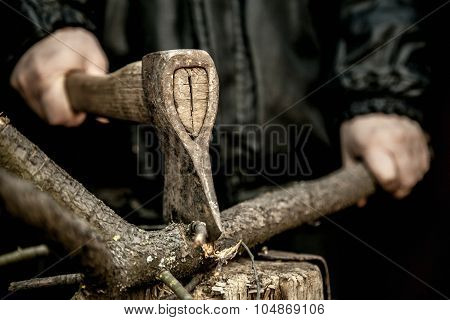 Male Hands Chopping Firewood