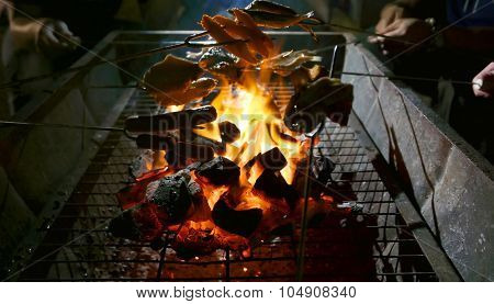 Chinese style barbecue grill stand, food and fire