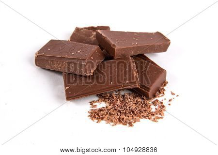 Chocolate pieces isolated on white background
