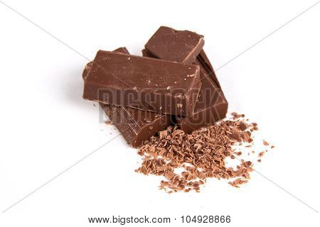 Chocolate pieces isolated on white background
