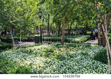 People have rest in Pumphouse Park in Manhattan