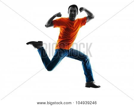 one causcasian man jumping happy  in silhouette isolated on white background