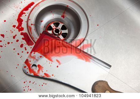 blood and cleaver in the sink