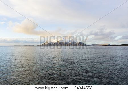 View of a Norwegian fjord with snowy mountains Nordland Norway
