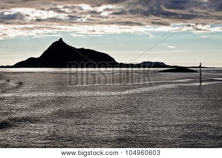 Norwegian Landscape At Sunset With The Sea Water And Mountain Fjord