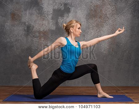 Young Woman Doing Yoga Asana