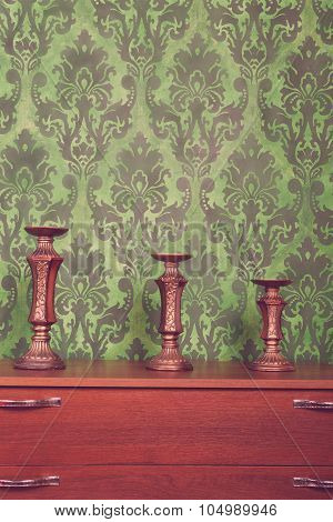 Three Vintage Chandeliers On Green Rococo Style Pattern Background