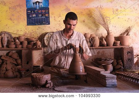 Ceramics. Manual production. A man at work.