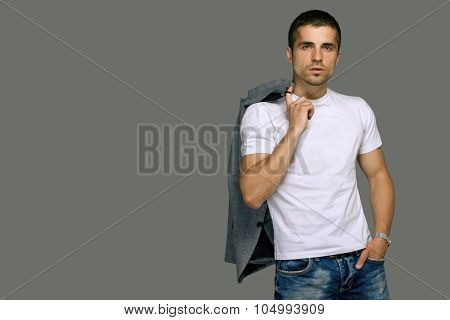 man in a white T-shirt and jeans, studio