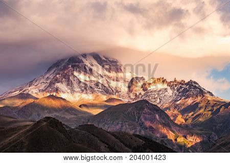 Landscape View Of Mt Kazbeg And Tsminda Sameba Church, Caucasus, Georgia