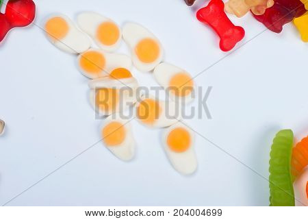 Tasty Scrambled Eggs Jelly Candy On White Background