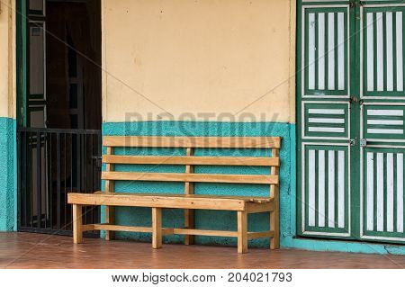 bench in front of colonial house in Ecuador