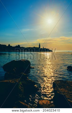 Sunset On The Seashore. City View Walk Along The Seafront