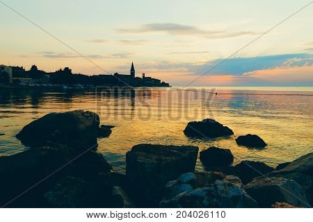Sunset On The Seashore. City View Walk Along The Seafront
