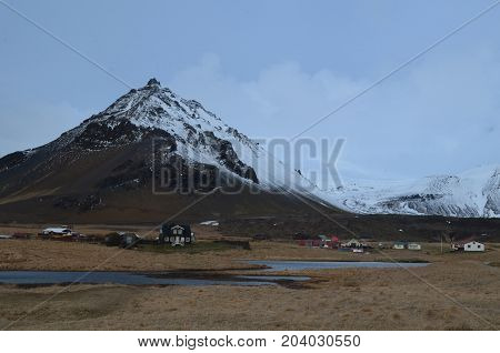 Beautiful Mt Stapafell in Iceland with a village at the base.