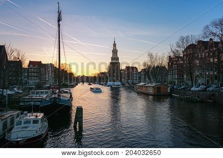 Amsterdam Netherlands - January 5 2017: View on the canal Oudeschans at Sunset in the center of Amsterdam.