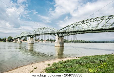 Maria Valeria bridge joins Esztergom in Hungary and Sturovo in Slovak republic across the Danube river. Transportation theme. Architectural scene.