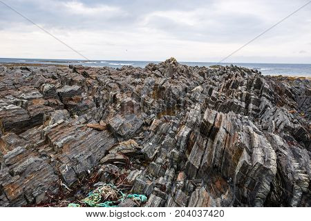 The texture of the north underwater rocks at low tide