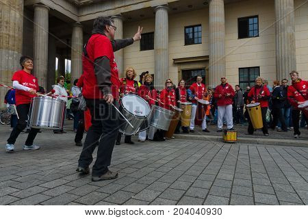 BERLIN - MAY 01 2015: International Labour Day. Demonstrators near the Brandenburg Gate.