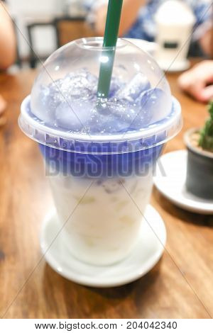 butterfly pea milk or milk with butterfly pea juice topping